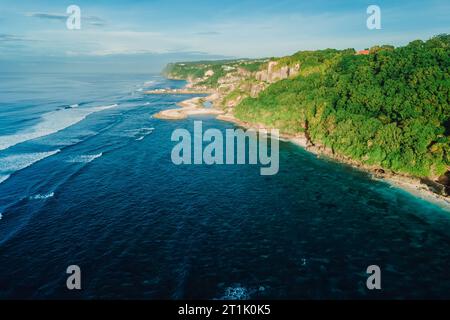 Aerial view of coastline with ocean and beaches under cliffs in Bali. Stock Photo