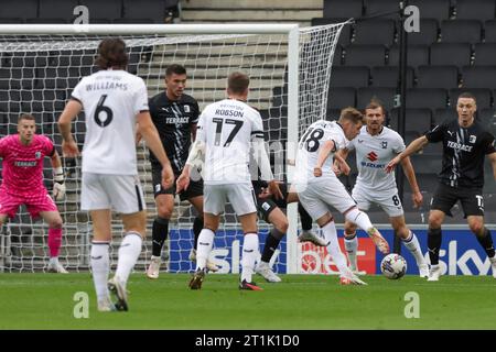 Max Dean scores for Milton Keynes Dons, to take the lead making it 1 - 0 against Barrow, during the first half of during the Sky Bet League 2 match between MK Dons and Barrow at Stadium MK, Milton Keynes on Saturday 14th October 2023. (Photo: John Cripps | MI News) Credit: MI News & Sport /Alamy Live News Stock Photo