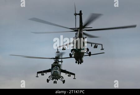 Namest Nad Oslavou, Czech Republic. 14th Oct, 2023. Farewell ceremony with Mil Mi-24/35 Hind attack helicopters (pictured) at 22nd Helicopter Air Base Namest nad Oslavou with the participation of the Air Force command and former and current squadron and base commanders was held in Namest nad Oslavou, Trebic district, Vysocina Region, Czech Republic, on October 14, 2023. Credit: Lubos Pavlicek/CTK Photo/Alamy Live News Stock Photo