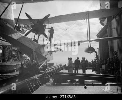 HMS Howe. August 1942. Preparing to recover paravanes on the fo'c's'le ...