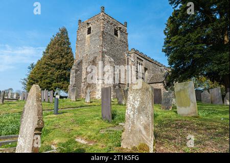 A view of the parish church of St. Mary in the Derbyshire village of Tissington in the Peak District in April 2019. Stock Photo
