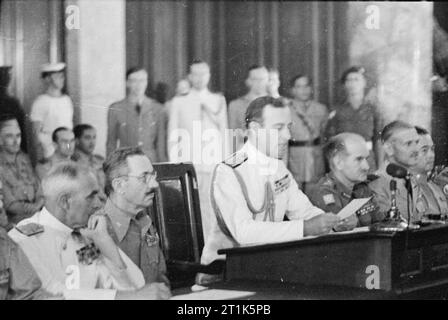 Japanese Surrender at Singapore, 12 September 1945 Admiral Lord Louis Mountbatten reads the surrender terms to the Japanese delegates. Stock Photo