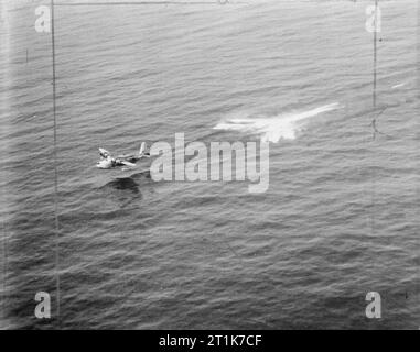 Sunderland EK573/P of No. 10 Squadron RCAF rescues three survivors from ...