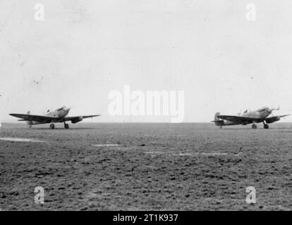 RAF FIGHTER COMMAND - Spitfires of No. 19 Squadron flying in formation ...