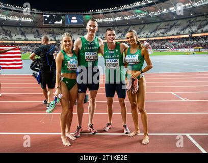 Sophie Becker, Jack Raftery, Christoper O'Donnell and Sharlene Mawdsley of Ireland celebrate after competing in the mixed 4x400m relay at the World At Stock Photo