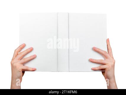 Hand holding open hardcover book, hard cover mockup, empty blank hardback mock-up isolated on white Stock Photo