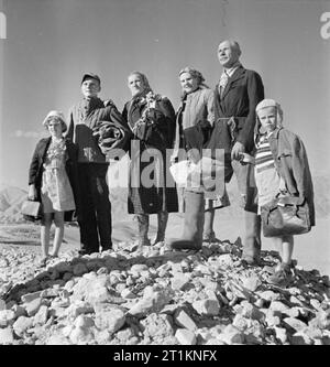 Evacuation of Polish Civilians From the Soviet Union To Persia, 1942 The Kowalski family travel on foot from the Soviet Union over the mountains into Persia. Stock Photo
