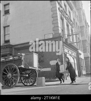 Van Girl- Horse and Cart Deliveries For the London, Midland and Scottish Railway, London, England, 1943. Stock Photo