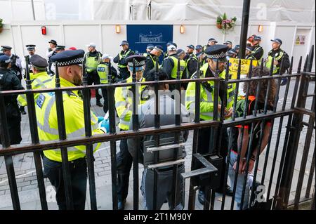 London, UK. 14 October 2023. Two young man are arrested following a confrontation with the police at the march in support of Palestine. Credit: Andrea Domeniconi/Alamy Live News Stock Photo