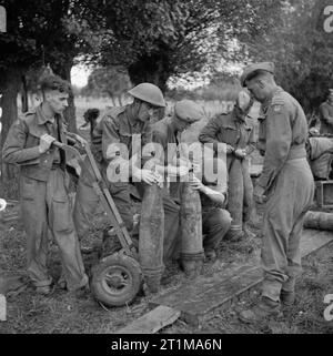 Howitzer Shell Fuse Gunners of the 51st Heavy Regiment, Royal Artillery, prepare 7.2-inch ...