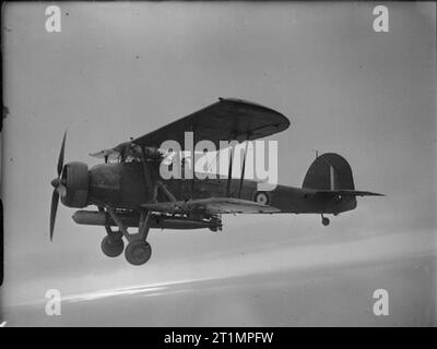 The Royal Navy during the Second World War No 785 Squadron, Fleet Air Arm: A Fairey Swordfish Mk I Naval torpedo aircraft during a training flight from Royal Naval Air Station Crail. Stock Photo