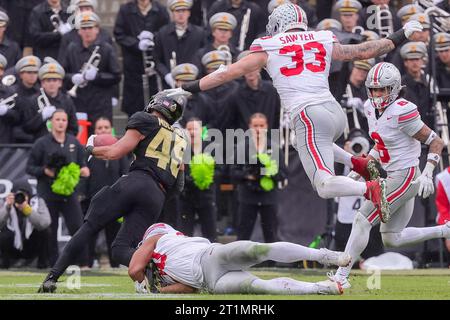 West Lafayette, Indiana, USA. 14th Oct, 2023. Purdue Boilermakers running back Devin Mockobee (45) carries the ball during the game between the Ohio State Buckeyes and the Purdue Boilermakers at Ross-Ade Stadium, West Lafayette, Indiana. (Credit Image: © Scott Stuart/ZUMA Press Wire) EDITORIAL USAGE ONLY! Not for Commercial USAGE! Stock Photo