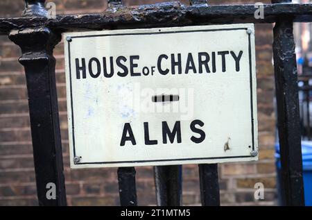 Housef Charity Alms Donation Slot Chute at The House of St Barnabas Soho London England UK Stock Photo