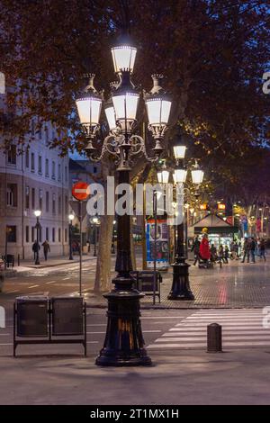 La Rambla, Barcelona, Spain - December 14th 2013: Street lights switched on at night. Stock Photo