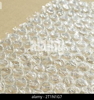 On corrugated cardboard paper plastic air bubble protection foil wrap texture background, air bubble packing texture Stock Photo