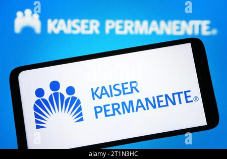 Ukraine. 14th Oct, 2023. In this photo illustration, Kaiser Permanente logo is seen on a smartphone and on a pc screen. (Photo by Pavlo Gonchar/SOPA Images/Sipa USA) *** Strictly for editorial news purposes only *** Credit: Sipa USA/Alamy Live News Stock Photo