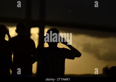 October 14, 2023, Natal, Rio Grande do Norte, Brasil: Natal (RN), 10/14/2023 - ECLIPSE/NATA/RN - Potiguares gather at strategic points all over to observe the Annular Solar Clipse. The capital of Rio Grande do Norte was one of the main cities in the country to observe the phenomenon of the Annular Solar Eclipse, it started around 3:25 pm and lasted 5:27 pm, Brasilia time. As a result, the sale of filters for welders No. 10 to 14 was no longer available for sale in construction materials in Natal-RN. (Foto: JosÃƒ © Aldenir/Thenews2/Zumapress) (Credit Image: © Jose Aldenir/TheNEWS2 via ZUMA Pres Stock Photo