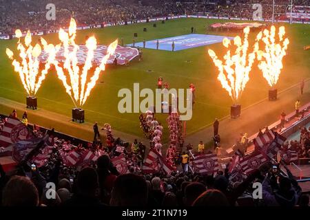 Manchester, UK. 14th Oct, 2023. The players walk out to pyrotechnics before the Betfred Super League Grand Final match Wigan Warriors vs Catalans Dragons at Old Trafford, Manchester, United Kingdom, 14th October 2023 (Photo by Steve Flynn/News Images) in Manchester, United Kingdom on 10/14/2023. (Photo by Steve Flynn/News Images/Sipa USA) Credit: Sipa USA/Alamy Live News Stock Photo