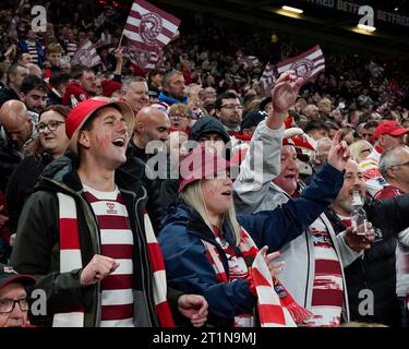 Manchester, UK. 14th Oct, 2023. Wigan Warriors fans cheer on their side during the Betfred Super League Grand Final match Wigan Warriors vs Catalans Dragons at Old Trafford, Manchester, United Kingdom, 14th October 2023 (Photo by Steve Flynn/News Images) in Manchester, United Kingdom on 10/14/2023. (Photo by Steve Flynn/News Images/Sipa USA) Credit: Sipa USA/Alamy Live News Stock Photo