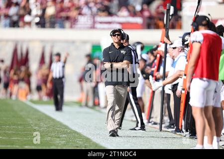 Blacksburg, Virginia, USA. 14th Oct, 2023. Wake Forest Demon Deacons head coach Dave Clawson on the sideline during the NCAA football game between the Wake Forest Demon Deacons and the Virginia Tech Hokies at Lane Stadium in Blacksburg, Virginia. Greg Atkins/CSM/Alamy Live News Stock Photo