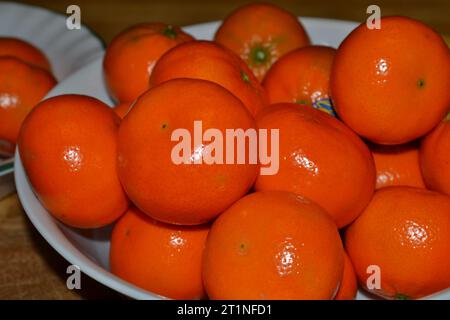June 19, 2021. New York. Halos fresh mandarin or tangerines in bag on white  background. Top view Stock Photo - Alamy