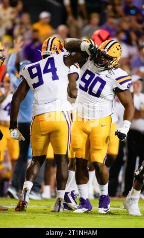 LSU defensive end Paris Shand (94) and offensive lineman Bo Bordelon ...