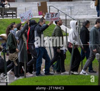 Cambridge, Massachusetts USA  October 14, 2023 Harvard Graduate Students for Palestine rally marching through Harvard University, Cambridge,, Massachusetts.  The rally was attended by about 300 people, many were not connected with Harvard.  (Rick Friedman ) Credit: Rick Friedman/Alamy Live News Stock Photo