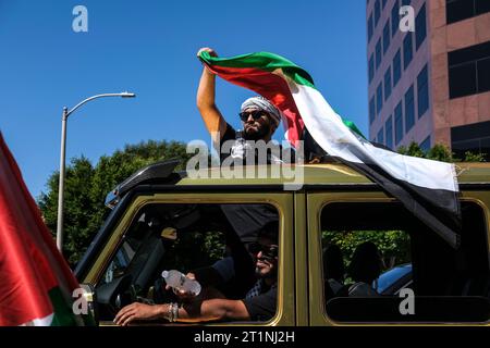 Los Angeles, California, USA. 14th Oct, 2023. Crowds gathered outside of the Israeli General Consulate in Los Angeles to protest the humanitarian crisis with ongoing siege of the Gaza Strip by Israel following the last week's attack in by Hamas. (Credit Image: © Adam DelGiudice/ZUMA Press Wire) EDITORIAL USAGE ONLY! Not for Commercial USAGE! Stock Photo