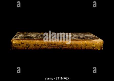 old book on a black background and copy space Stock Photo