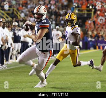 Auburn tight end Brandon Frazier (87) is tackled by Vanderbilt safety ...