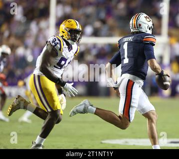 LSU defensive end Paris Shand (94) rushes against Trey Zuhn III (60 ...