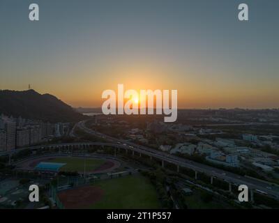 Aerial view of Sanxia District with cars on highway during sunset in New Taipei City, Taiwan. Stock Photo