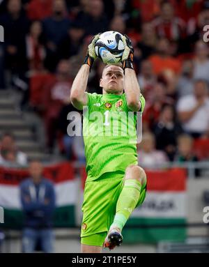 Budapest, Hungary. 14st October, 2023. Denes Dibusz of Hungary saves during the UEFA EURO 2024 European qualifier match between Hungary and Serbia at Puskas Arena on October 14, 2023 in Budapest, Hungary. Credit: Laszlo Szirtesi/Alamy Live News Stock Photo