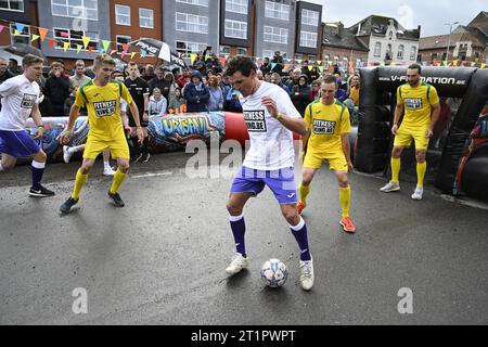 Retiring cyclist Greg Van Avermaet plays a game of football at a farewell event 'Goodbye Greg' for cyclist Van Avermaet, in Dendermonde. Van Avermaet says goodbye to the cycling peloton. After seventeen professional seasons with 42 victories, including Paris-Roubaix and the 2016 Olympic road race in Rio, he is officially hanging up his bike. To say goodbye in an appropriate manner, he organizes a cycling and football festival in his home town of Dendermonde. In the morning there is a Fan Ride and in the afternoon there is a Fan Zone and free festival. BELGA PHOTO TOM GOYVAERTS Stock Photo