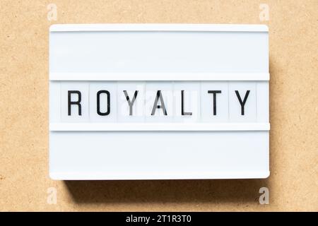 Lightbox with word royalty on wood background Stock Photo