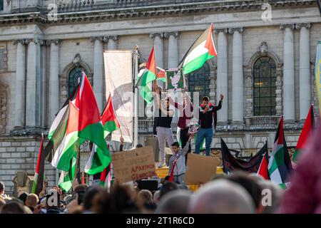 Belfast, UK. 15th Oct, 2023. A few thousand people attend the 'March for Palestine' in the Centre of Belfast to Highlight the Continuing retaliation by the Israel Defence Force in Gaza which has left 2300 death toll to date , after last weekend's massacre of 1300 Israelis by Hamas. There was a small Counter Demonstration by a few individuals who held up the Star of David Flag. The Rally was organised by the Ireland Palestine Solidarity Campaign (IPSC) Credit: Bonzo/Alamy Live News Stock Photo