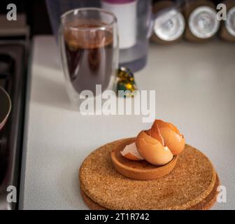Close up shot of a broken egg shells on cork coaster Stock Photo