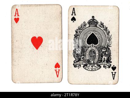 Vintage playing cards featuring a pair of aces on a white background. Stock Photo