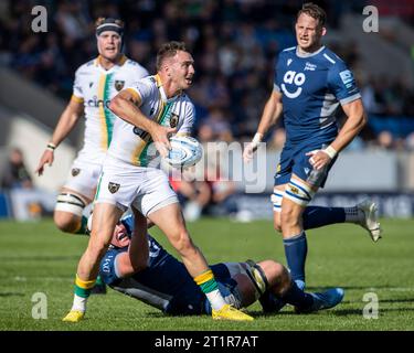 Salford, Lancashire, UK. 15th October 2023; AJ Bell Stadium, Salford, Lancashire, England; Gallagher Premiership Rugby, Sale Sharks versus Northampton; Tom James of Northampton Saints is tackled Credit: Action Plus Sports Images/Alamy Live News Stock Photo