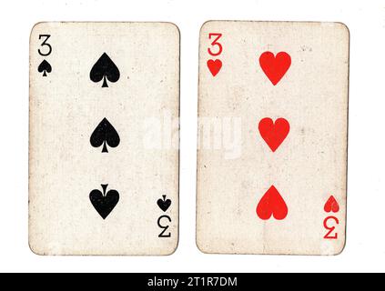 Vintage playing cards featuring a pair of threes on a white background. Stock Photo