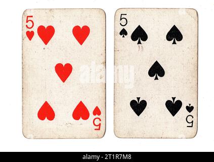 Vintage playing cards featuring a pair of fives on a white background. Stock Photo