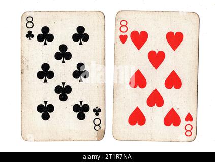 Vintage playing cards featuring a pair of eights on a white background. Stock Photo