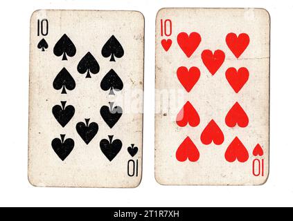 Vintage playing cards featuring a pair of tens on a white background. Stock Photo