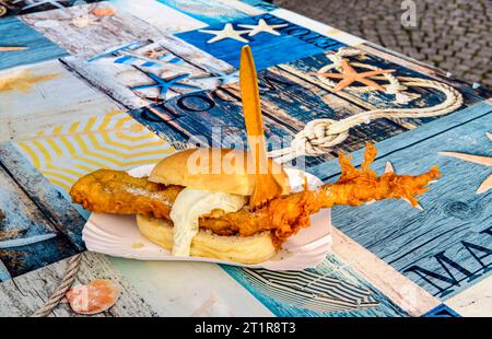 Bread roll with fried fish, Greetsiel, Germany Stock Photo