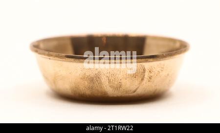 closeup of an empty vintage copper bowl for the kitchen isolated in a white background Stock Photo