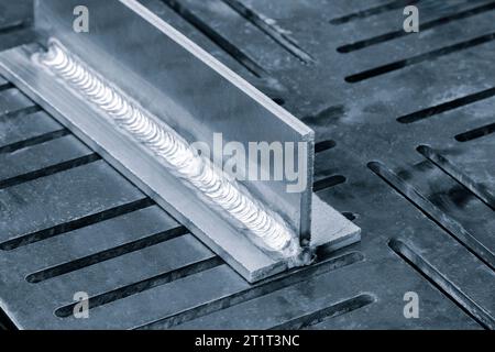 welding seam onto steel metal Industrial steel welder in factory Stock Photo