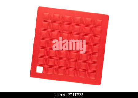 One silicone pot holder, macro, isolated on white background, top view. Stock Photo