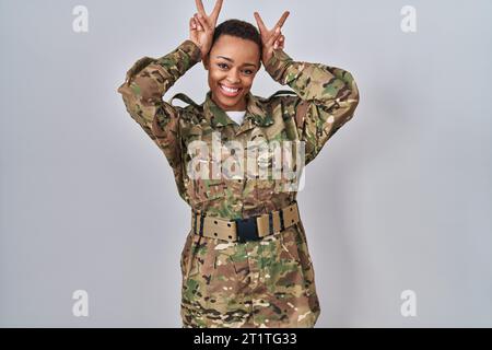 African american female soldier posing by the mirror Stock Photo