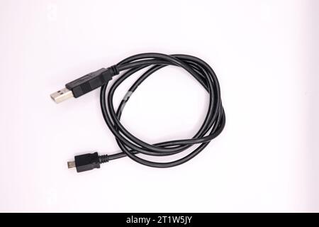 A view of a charging cable on white background Stock Photo