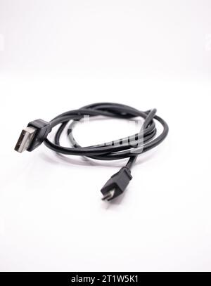 A view of a charging cable on white background Stock Photo